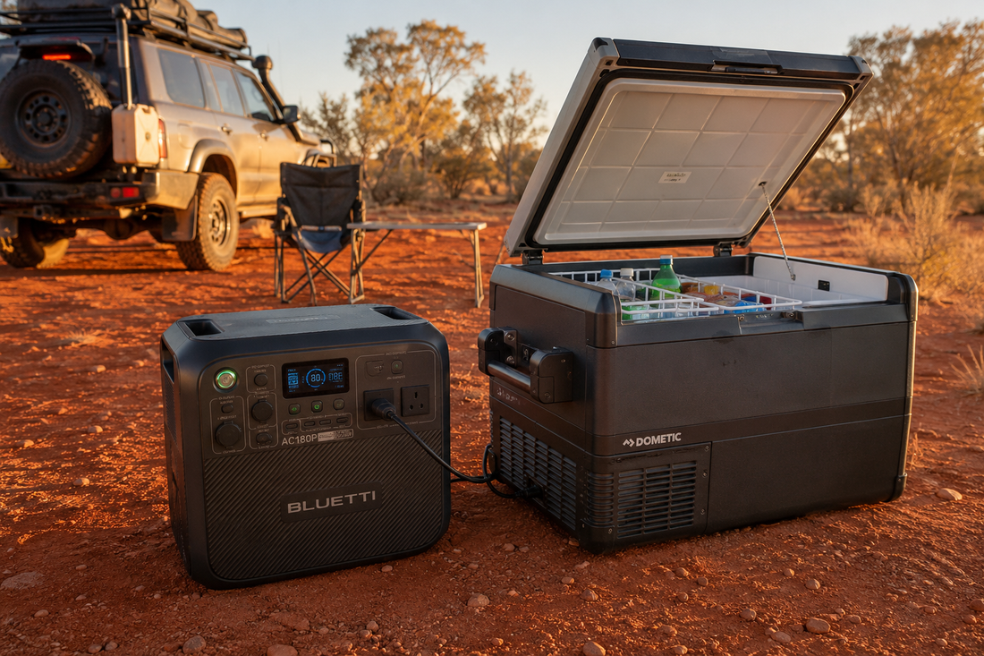 BLUETTI portable power station connected to a Dometic camping fridge at an Australian outback campsite with a 4WD in the background