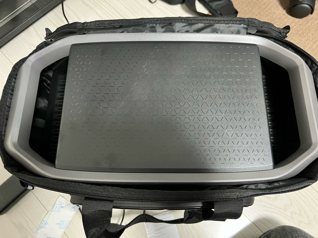Top-down view of an EcoFlow DELTA 3 Series power station fitting inside the open protective bag